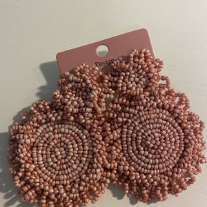 Soft neutral pink statement earrings